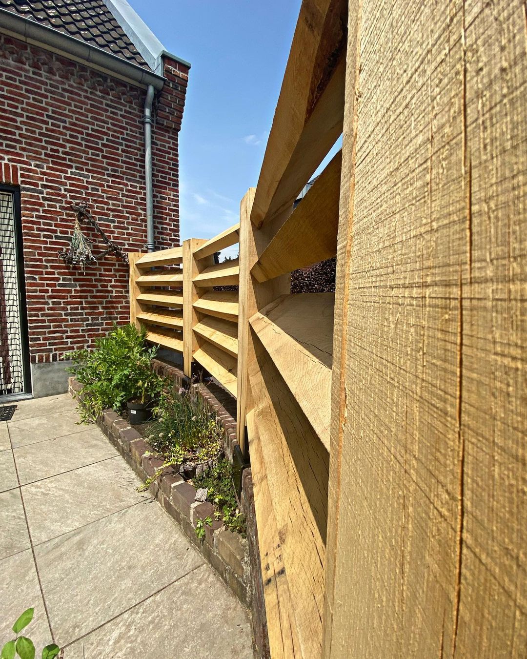 Lamellen hek werk van eikenhout 1